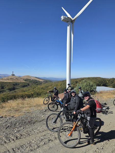 A wind turbine, Buzludzha on the horizon