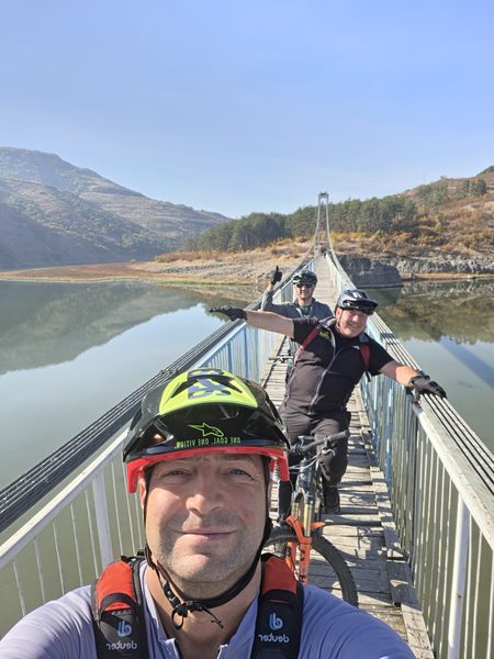 Selfie on the suspension bridge over the reservoir